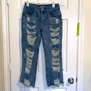 Mid rise straight leg super distressed ankle jeans
